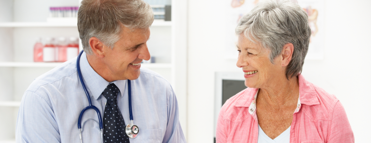 Smiling Doctor and Patient